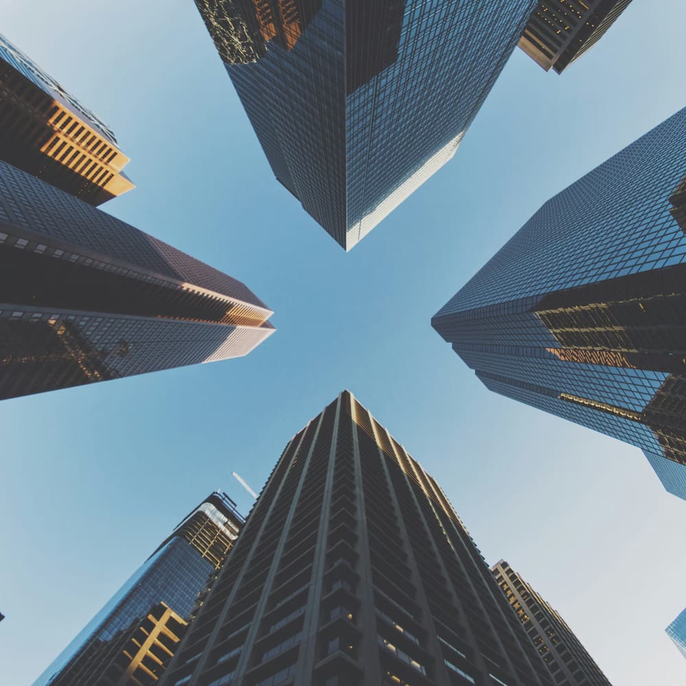 Corporate towers seen from street level
